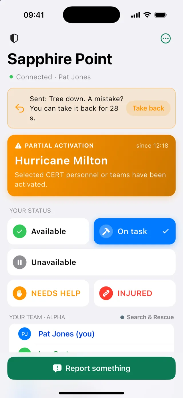 The phone app: the team's readiness and the member's status buttons.